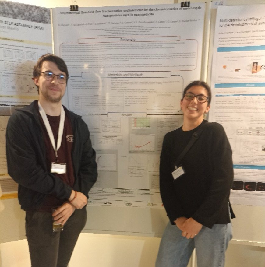 Ester Cantoni and a collaborator standing beside the joint iron oxide nanoparticle poster at isFFF 2024